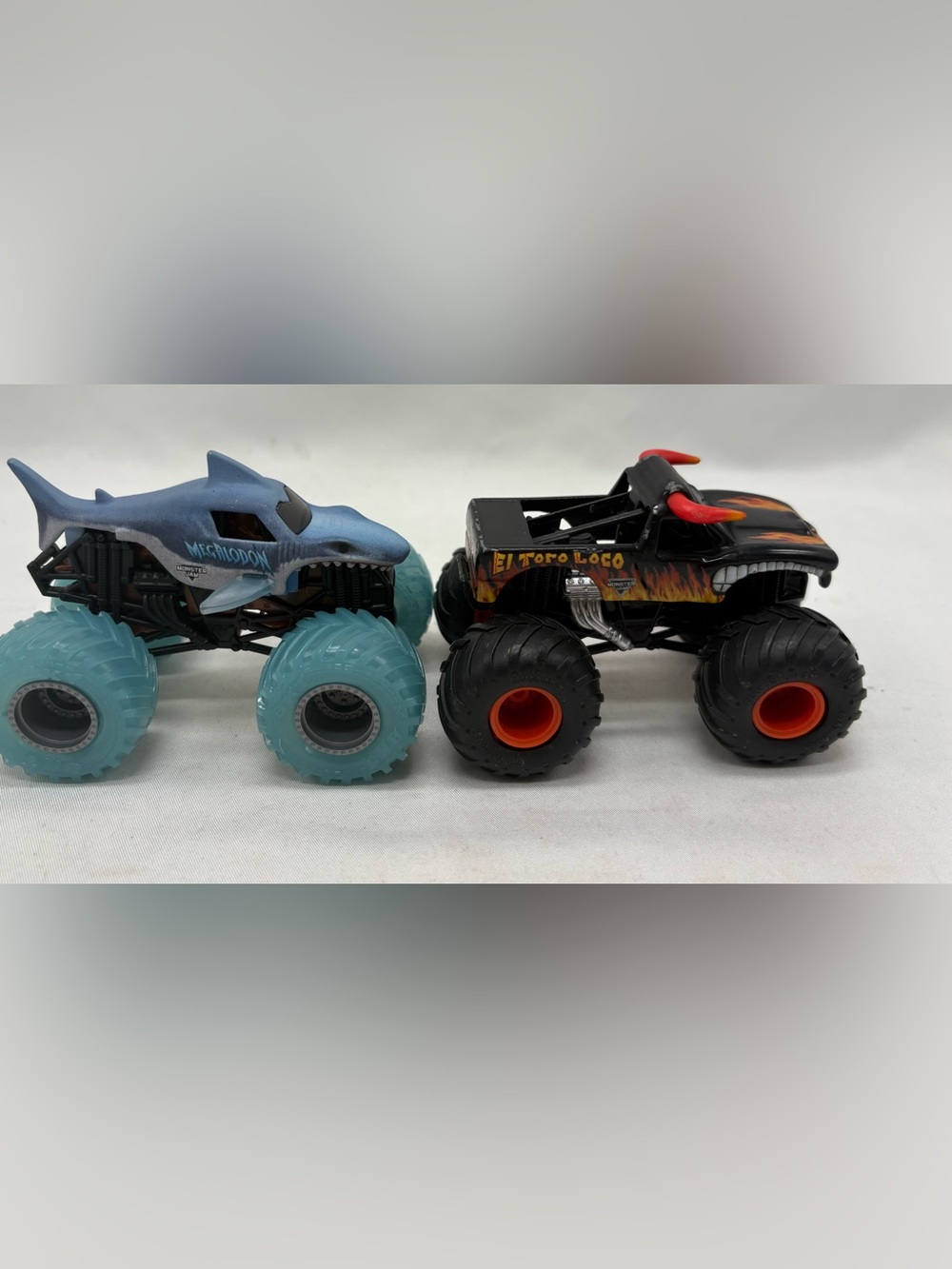 Hot Wheels Monster Jam Trucks El Toro Loco & Megalodon Shark  Lot Die-Cast 1:64